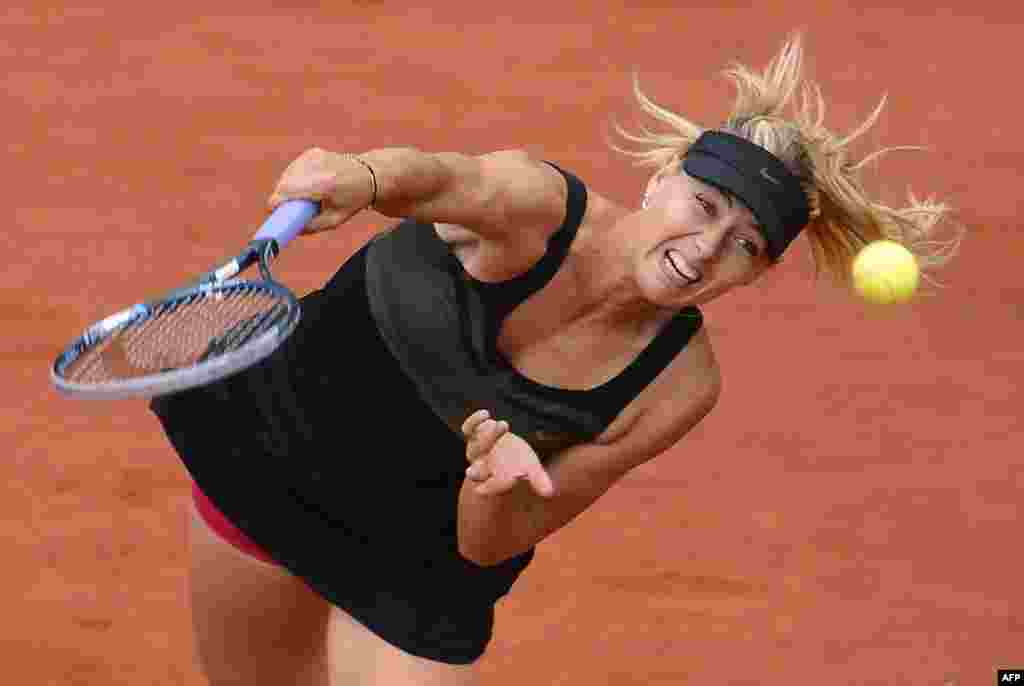 Ruska tenisačica Maria Šarapova osvaja French Open za žene, Pariz, 9. juni 2012. Foto: AFP / Pascal Guyot