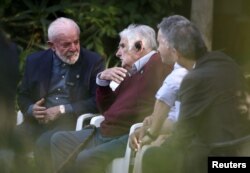 ხოსე მუხიკა ხვდება ბრაზილიის პრეზიდენტს, 2024 წლის დეკემბერი.