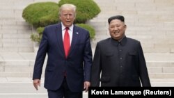 Donald Tramp i Kim Džong Un, 30. juna 2019.