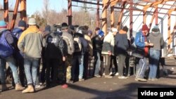 Serbia - migrants and refugees gather in an abandoned building near Sid, Serbia, near the Croatian border. roundup screen grab