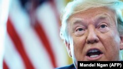 U.S. President Donald Trump speaks before signing sanctions on Iran's supreme leader on June 24.