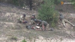 Ветерани АТО разом із британськими інструкторами відбивали засідку та рятували пораненого Ветерани АТО разом із британськими інструкторами відбивали засідку та рятували пораненого