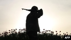 Боец оппозиционной сирийской группировки в городе Дераа