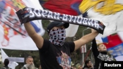 Protesters marching in Belgrade on October 11