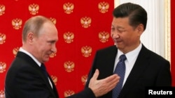 Ruski predsjednik Vladimir Putin i predsjednik Kine Xi Jinping 