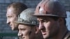 Miners go back to work in Zasyadko, one day after the accident happened
