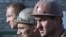 Miners go back to work in Zasyadko, one day after the accident happened