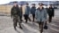 Senior commanders of Russia's Strategic Rocket Forces enter a U.S. intercontinental ballistic missile base in October 1996. 