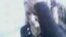 A video depicting a Chechen woman being abused by security personnel