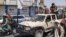 Victorious Taliban fighters drive an Afghan National Army vehicle through the streets of Laghman Province.