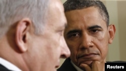 Обама слухає Нетаньягу на зустрічі в Вашингтоні 20 травня 2011 року