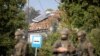 Soldiers patrol the street, following violations of Polish airspace during a Russian attack on Ukraine, in Wyryki