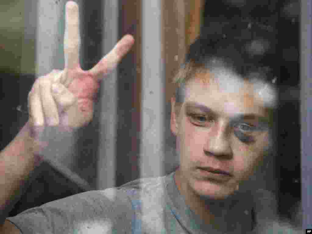 Bjelorusija - Na mirne anti-vladine demonstracije policija je reagirala nasiljem, Minsk, 29.07.2011. Foto:AP / Sergei Grits 