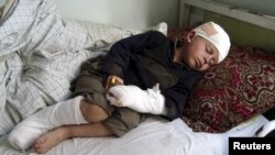 هغه ماشوم چې په وسلهوالو نښتو کې ټپي شوی دی. 20Feb2011