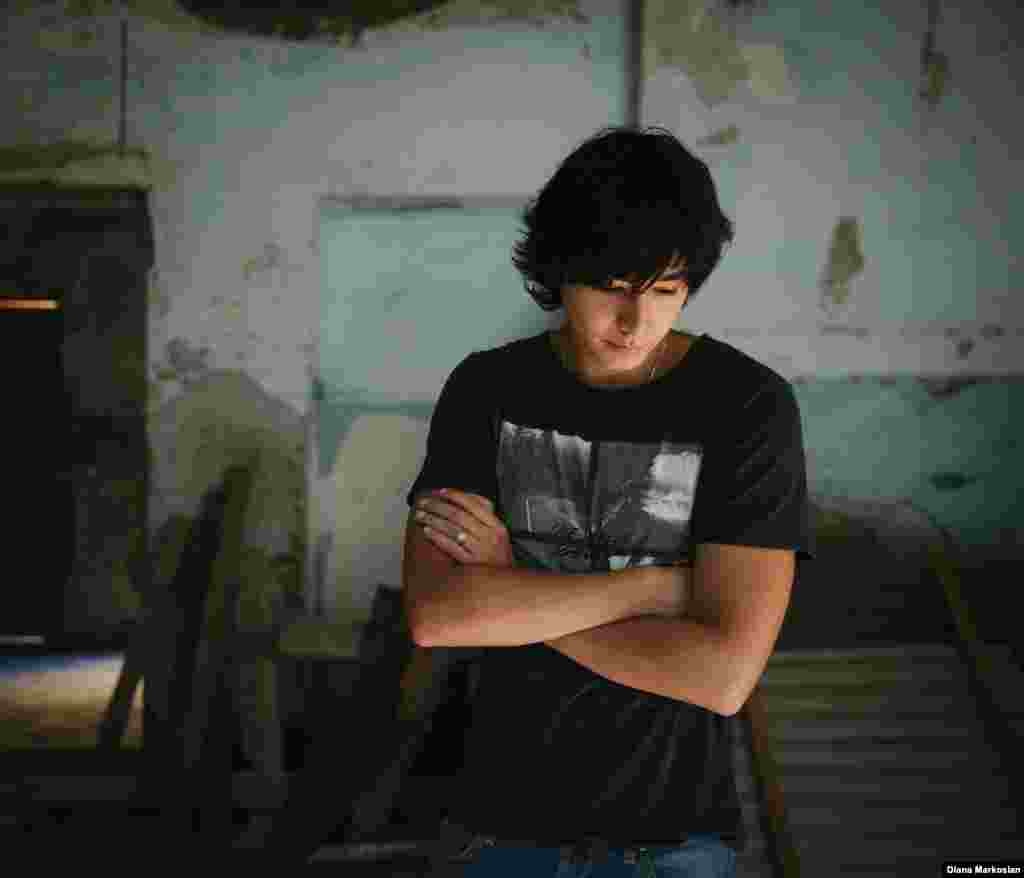 Azamat Dzebisov's cousin, Zaur, was like a brother -- the "closest person" in the world to him. They were raised together in the same house, separated by only a year. On the first day of school, they were taken hostage together, along with Azamat's mother, Svetlana. During the course of the three-day siege, the cousins were split up. Zaur's burned body was later found in the school gymnasium. Azamat, 20, now studies in Moscow, but still spends his vacations in Beslan. Standing in his old classroom, he remembers a series of dreams he had about Zaur in the weeks after his death. "In the very last dream, he was parting with me and calling for me to come with him. I told him no, I have things left to do here. He smiled and told me good-bye."